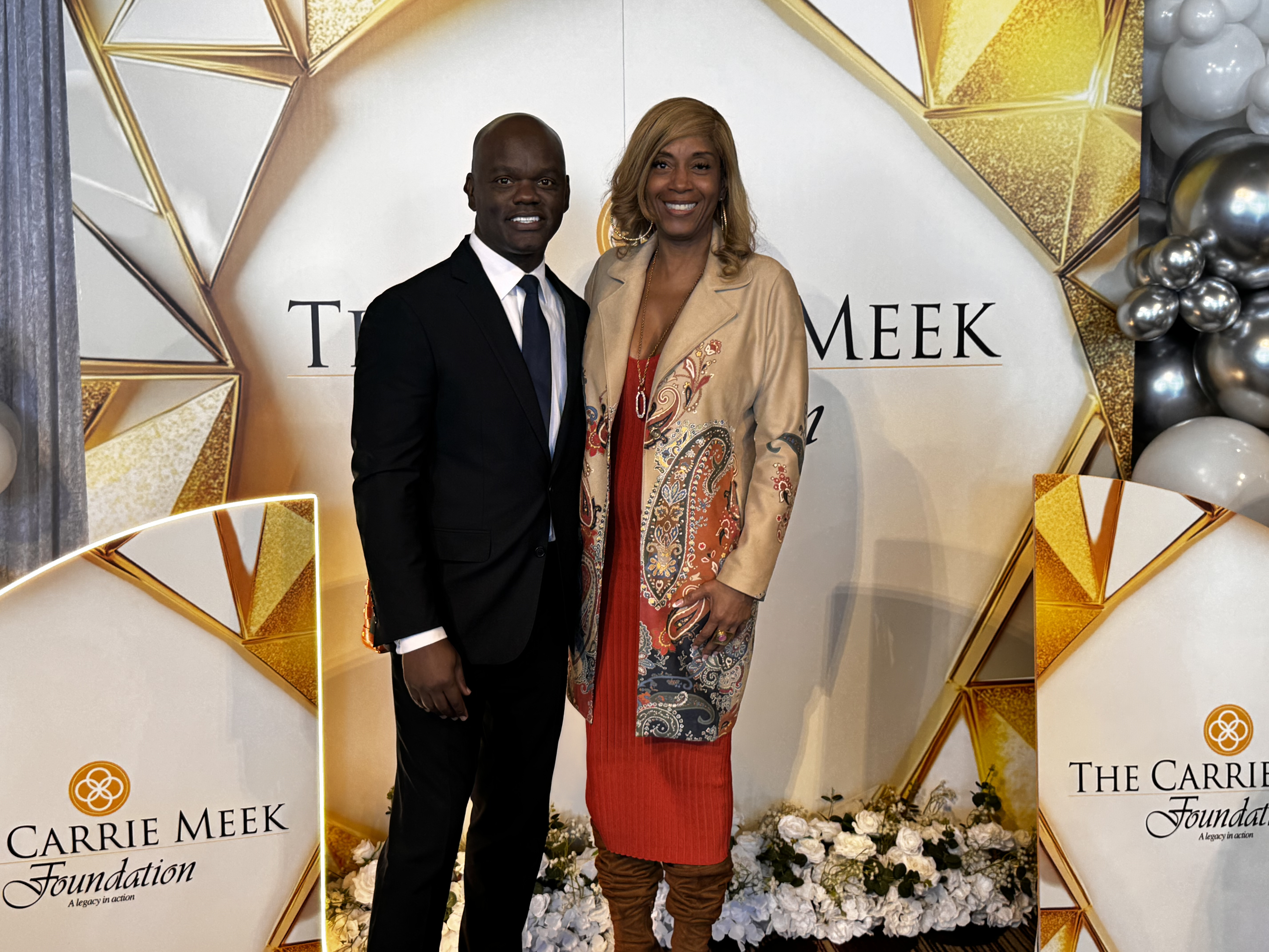 Beatrice Louissaint with Commissioner Kionne McGhee