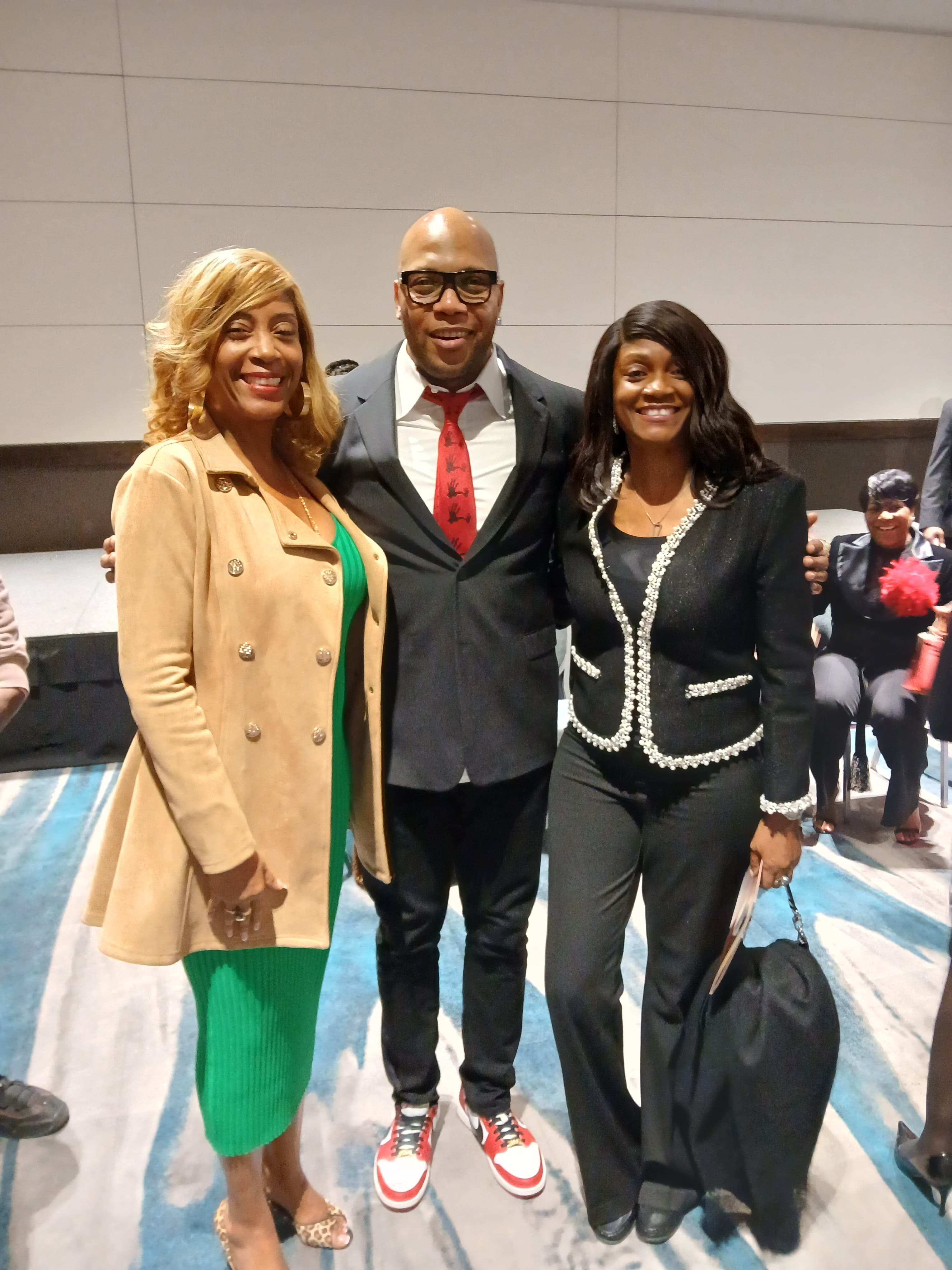 Beatrice and Marie Louissaint with Flo Rida